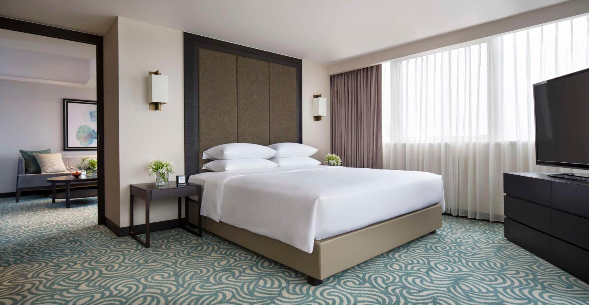 Grand Hyatt Taipei Hotel Kültér fotó A bedroom at the hotel